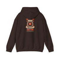 Mom Raises a Doctor Hooded Sweatshirt - Unisex Heavy Blend™
