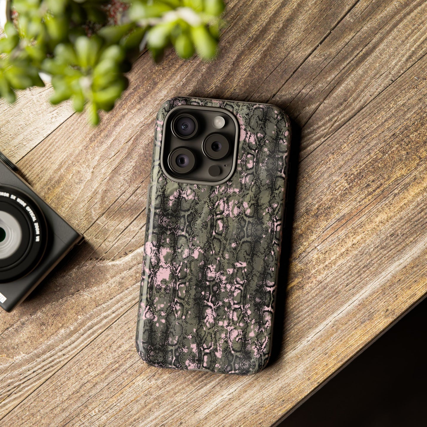 Camo Snake Pattern Phone Case – Rugged Protection Meets Bold Style  Turn heads while protecting your phone with this fierce camo snake pattern case—where urban edge meets outdoor grit.